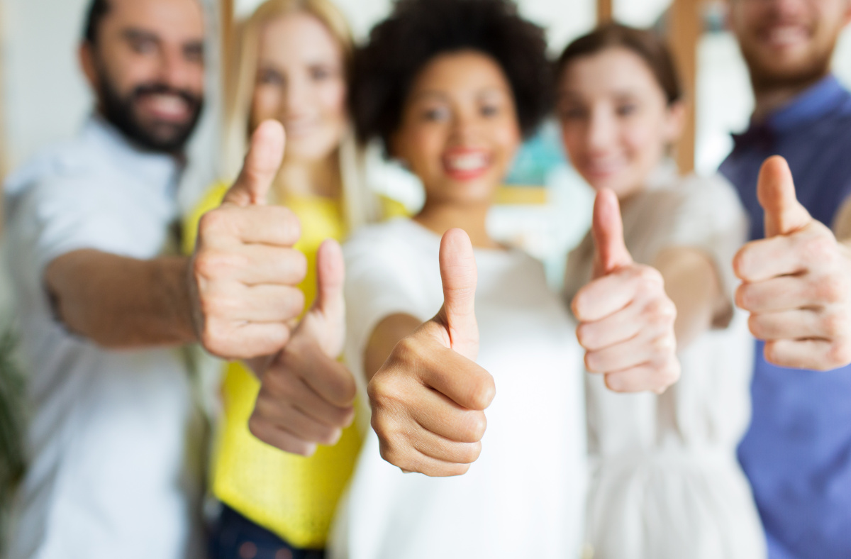 People showing thumb lift