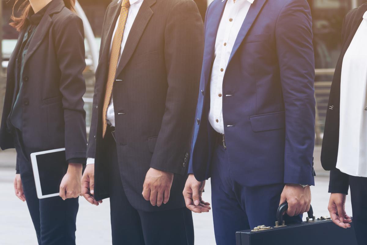 Business people line up.