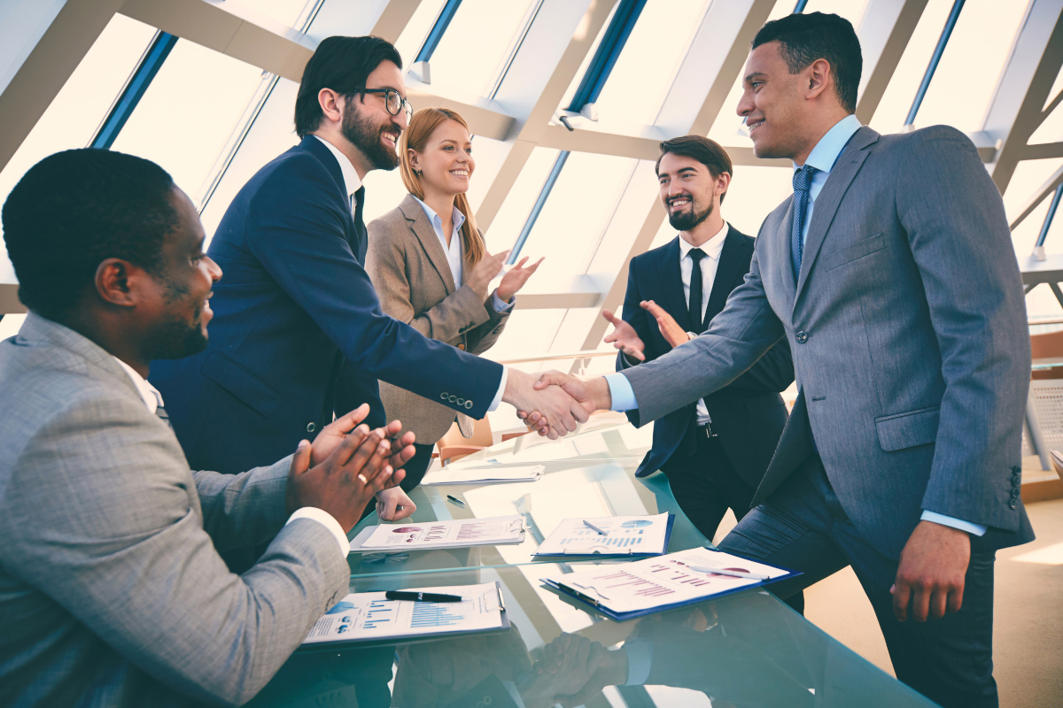 People shaking hands in agreement