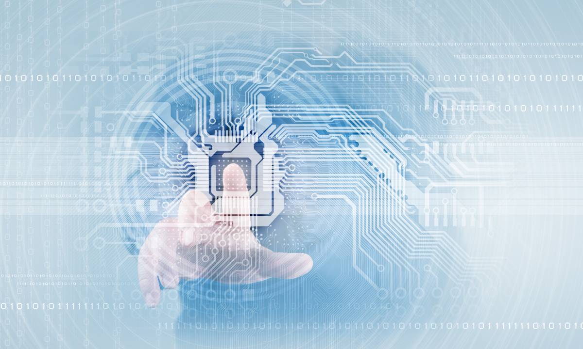 A hand touching a digital display of a circuit